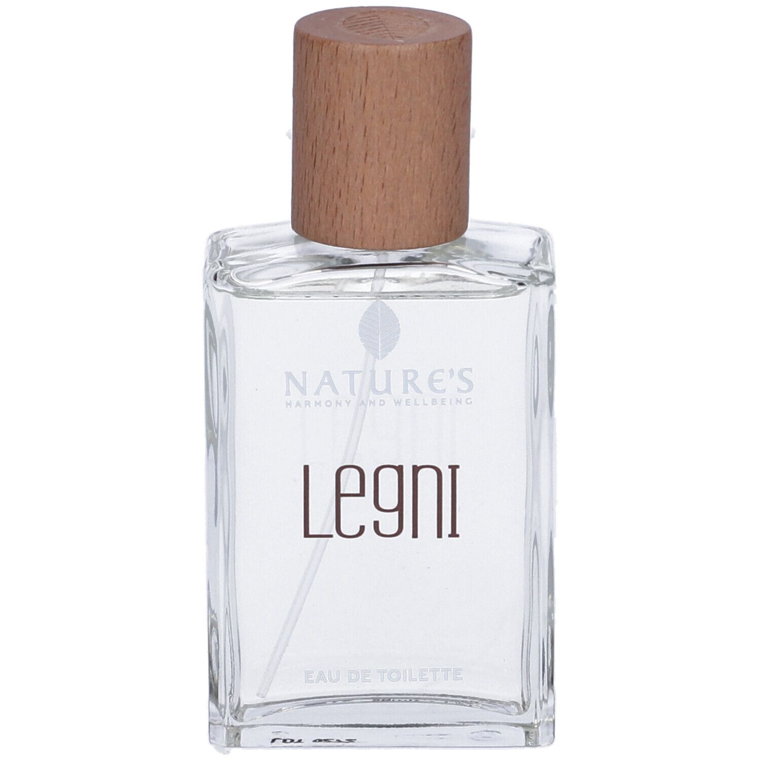 Flacone in vetro con tappo in legno. Scritta: Legni Eau de Toilette. Forma rettangolare. Contenuto trasparente.