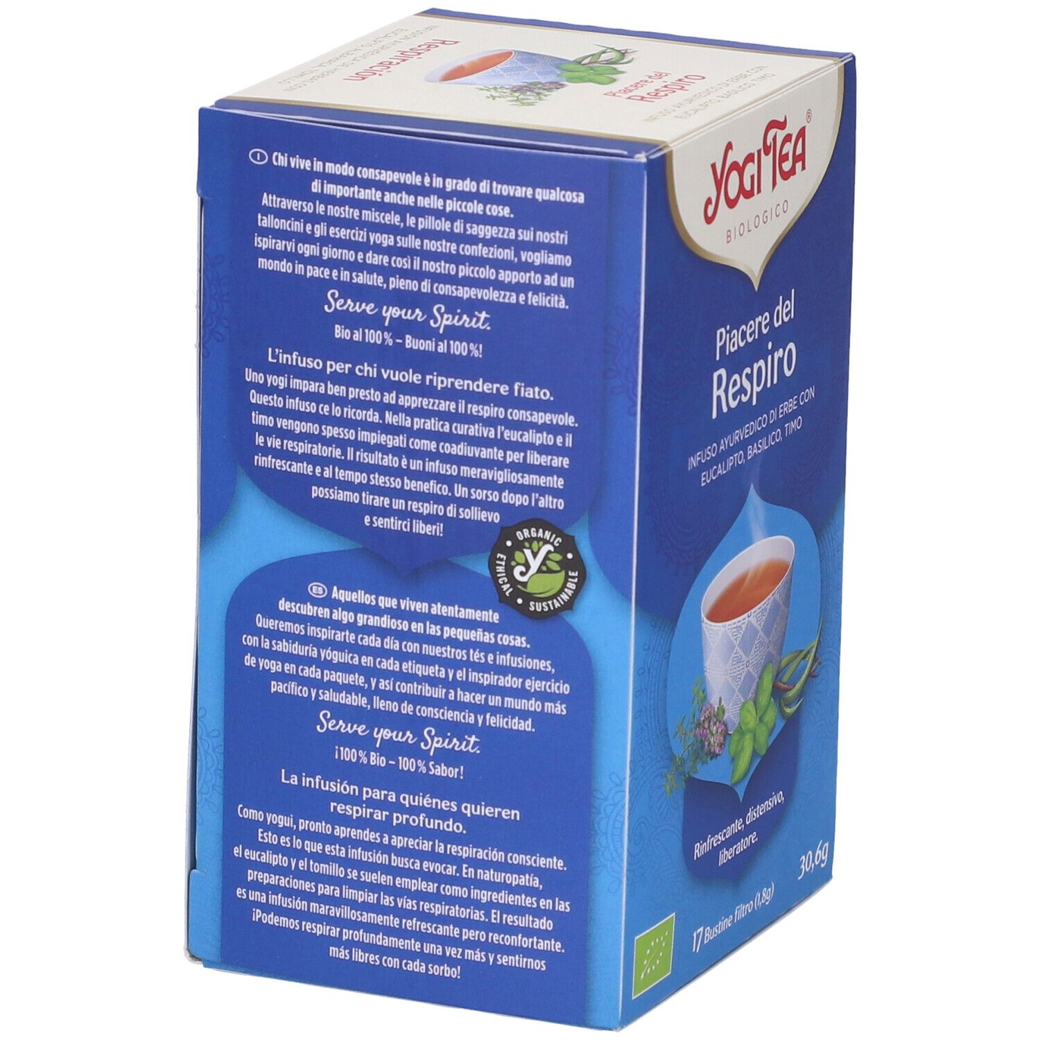 Scatola Yogi Tea blu. Scritta: Piacere del Respiro. Immagine: tazza di tè, erbe. Retro: testo, logo. 17 bustine.