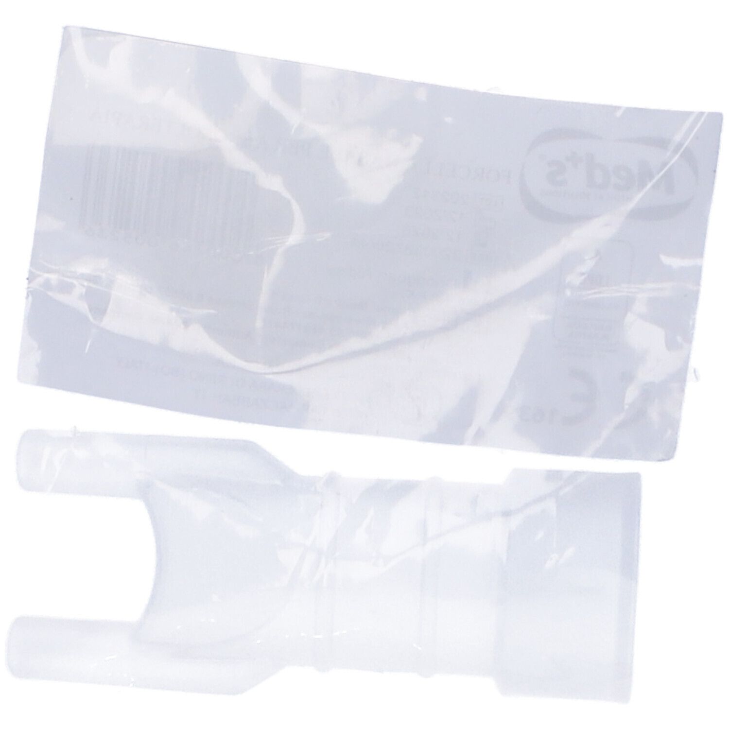 Transparente Nasenkanüle für Aerosoltherapie. Zwei Öffnungen, verbunden mit einem zylindrischen Teil. Liegt neben der Verpackung.