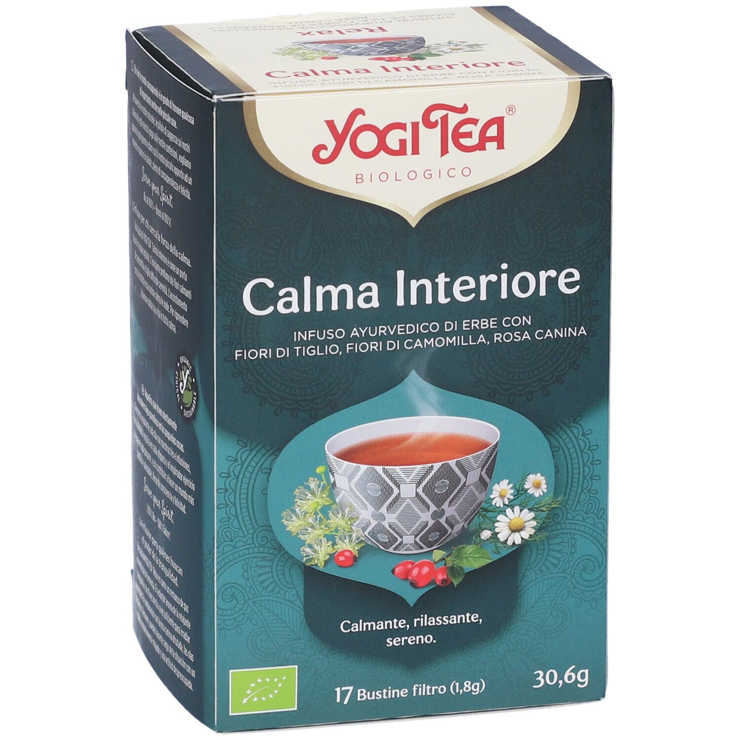 Verpackung von Yogi Tea Calma Interiore. 17 Filterbeutel. Bio-Zertifizierung. Abbildung einer Tasse Tee mit Kräutern.