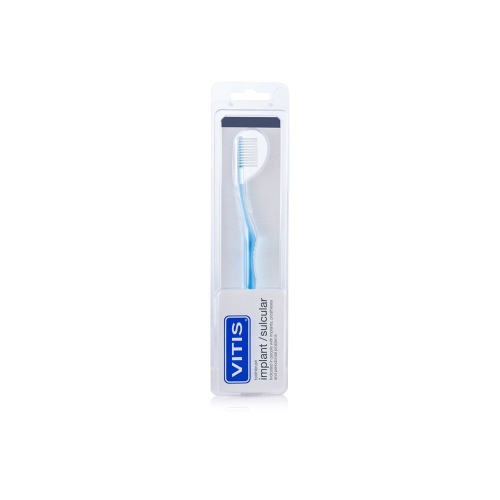 Spazzolino in confezione trasparente. Manico blu, testina bianca. Scritta: VITIS, implant/sulcular.