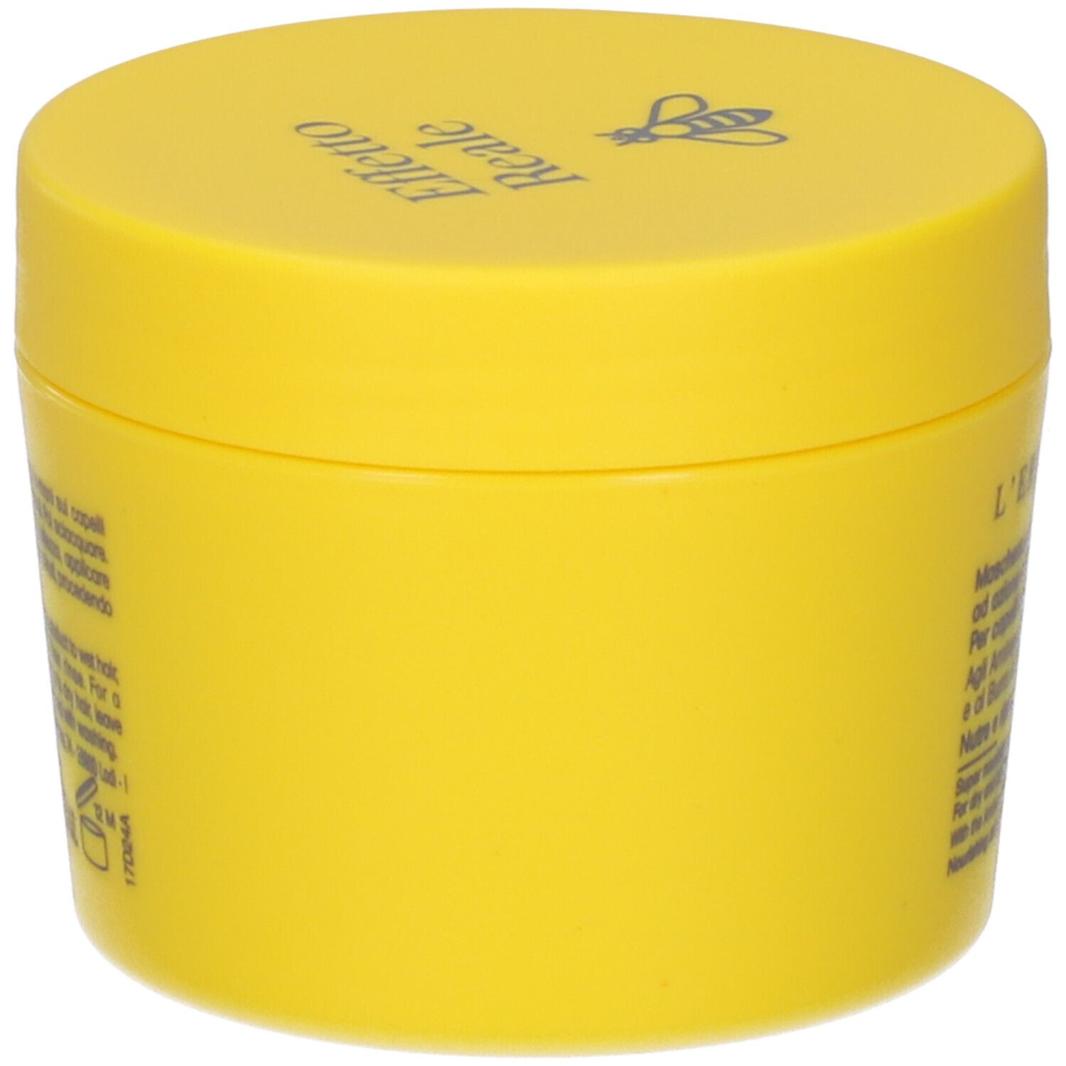 Barattolo giallo. Scritta: Effetto Reale, L'Erbolario. Logo ape. Testo in italiano e inglese.