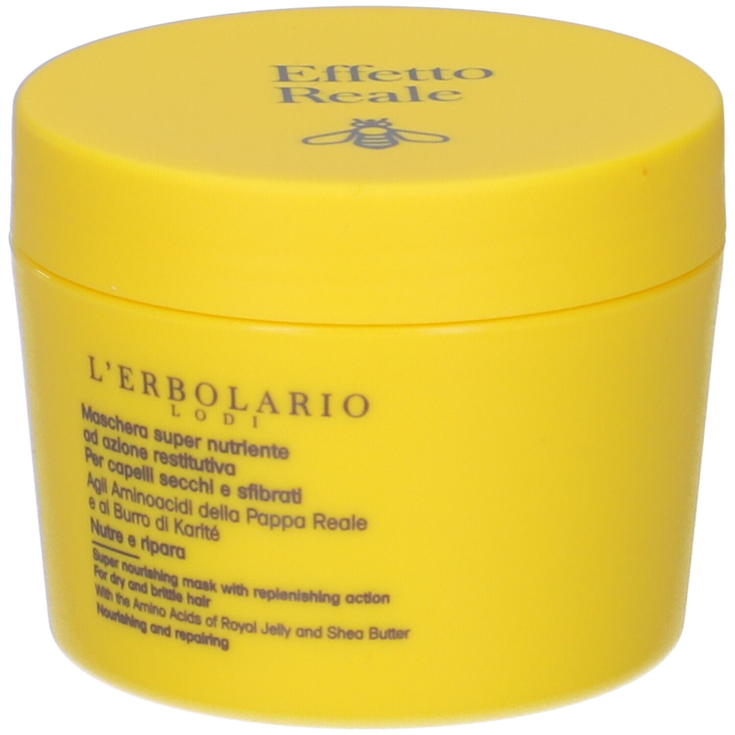 Barattolo giallo con scritta: Effetto Reale, L'Erbolario. Testo in italiano e inglese. Logo ape.