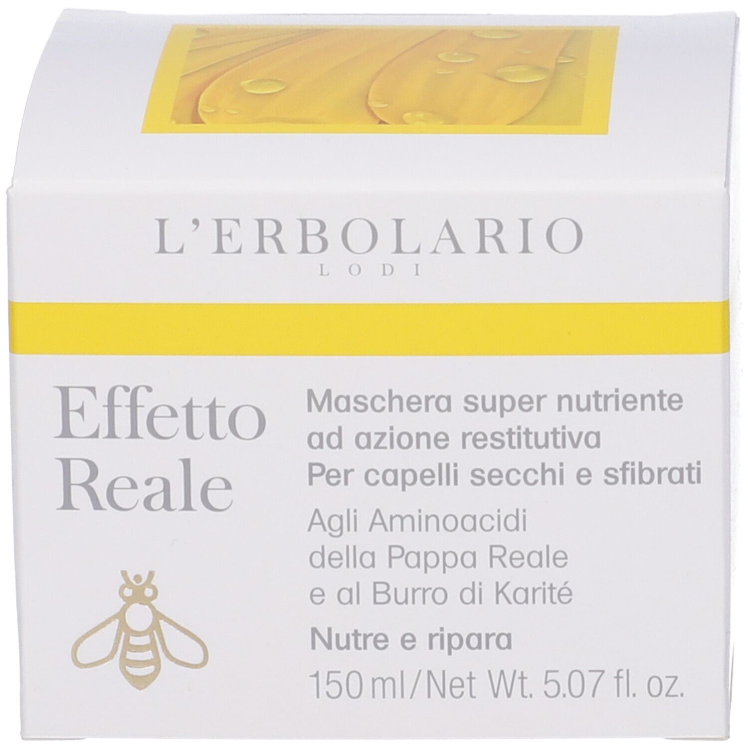 Scatola bianca. Scritta: Effetto Reale, L'Erbolario. Testo in italiano. Logo ape.