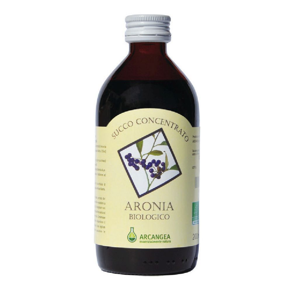 Bottiglia di vetro marrone con tappo bianco. Etichetta con testo: Aronia Biologico, Succo Concentrato. Sigillo biologico.