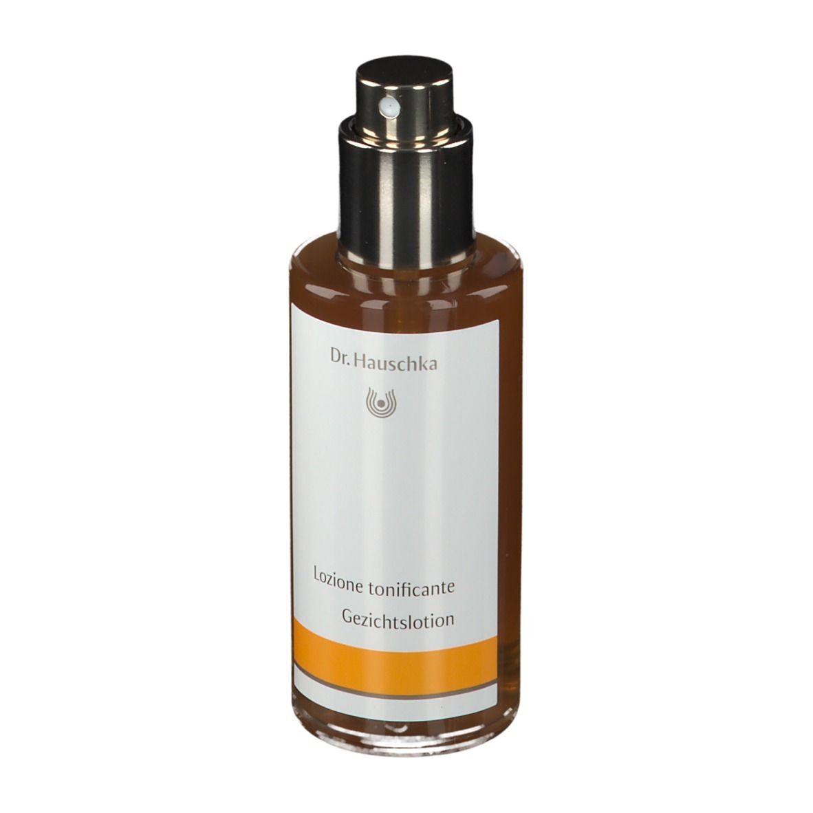 Flacone di vetro marrone con vaporizzatore. Etichetta con testo: Gesichtstonikum. Marchio: Dr. Hauschka.