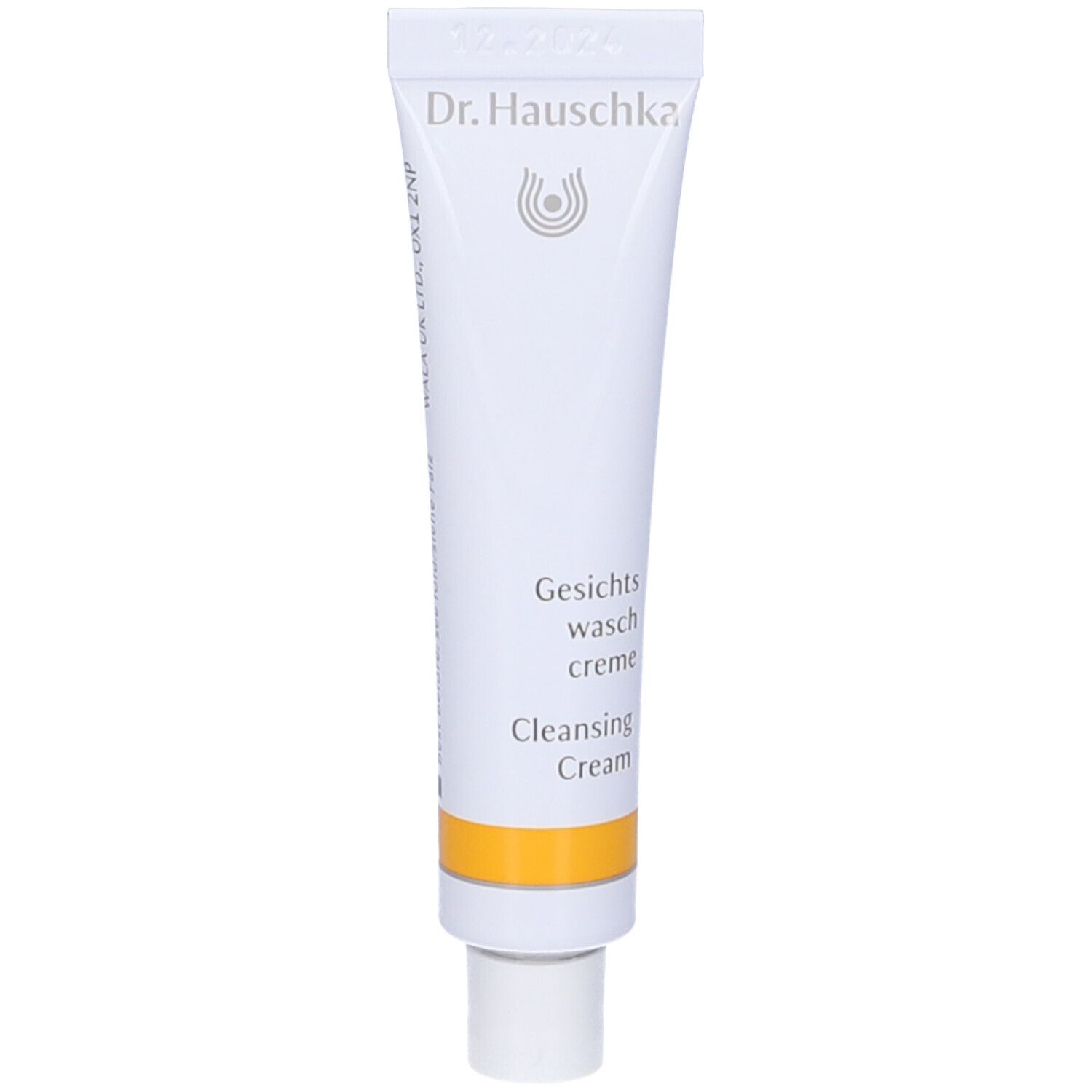 Tubo bianco con fascia gialla. Scritta: Dr. Hauschka, Gesichts Waschcreme, Cleansing Cream.