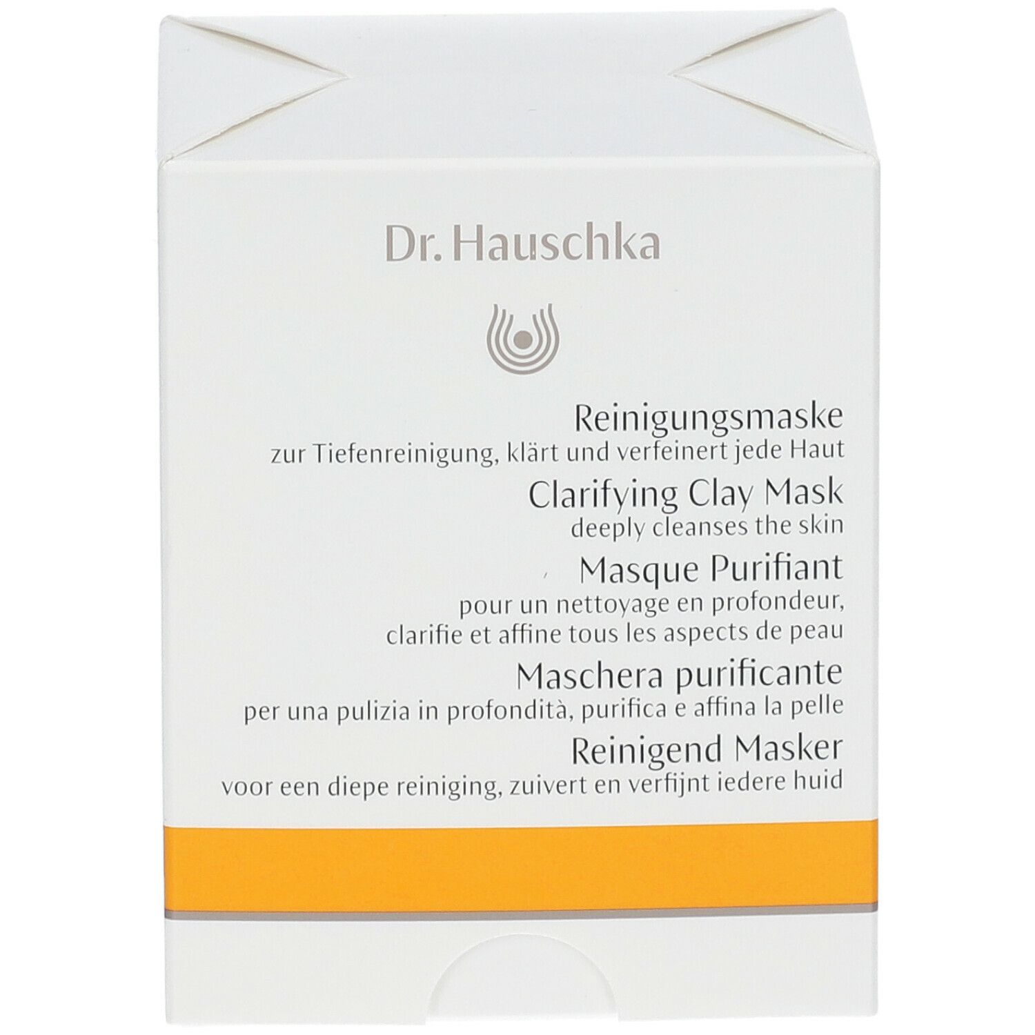 Scatola bianca Dr. Hauschka con testo in tedesco, inglese, francese, italiano e olandese. Striscia arancione.