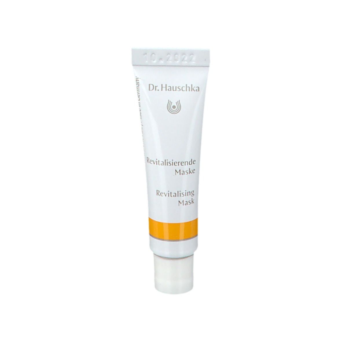 Tubo bianco con fascia gialla. Scritta: Dr. Hauschka, Revitalisierende Maske.