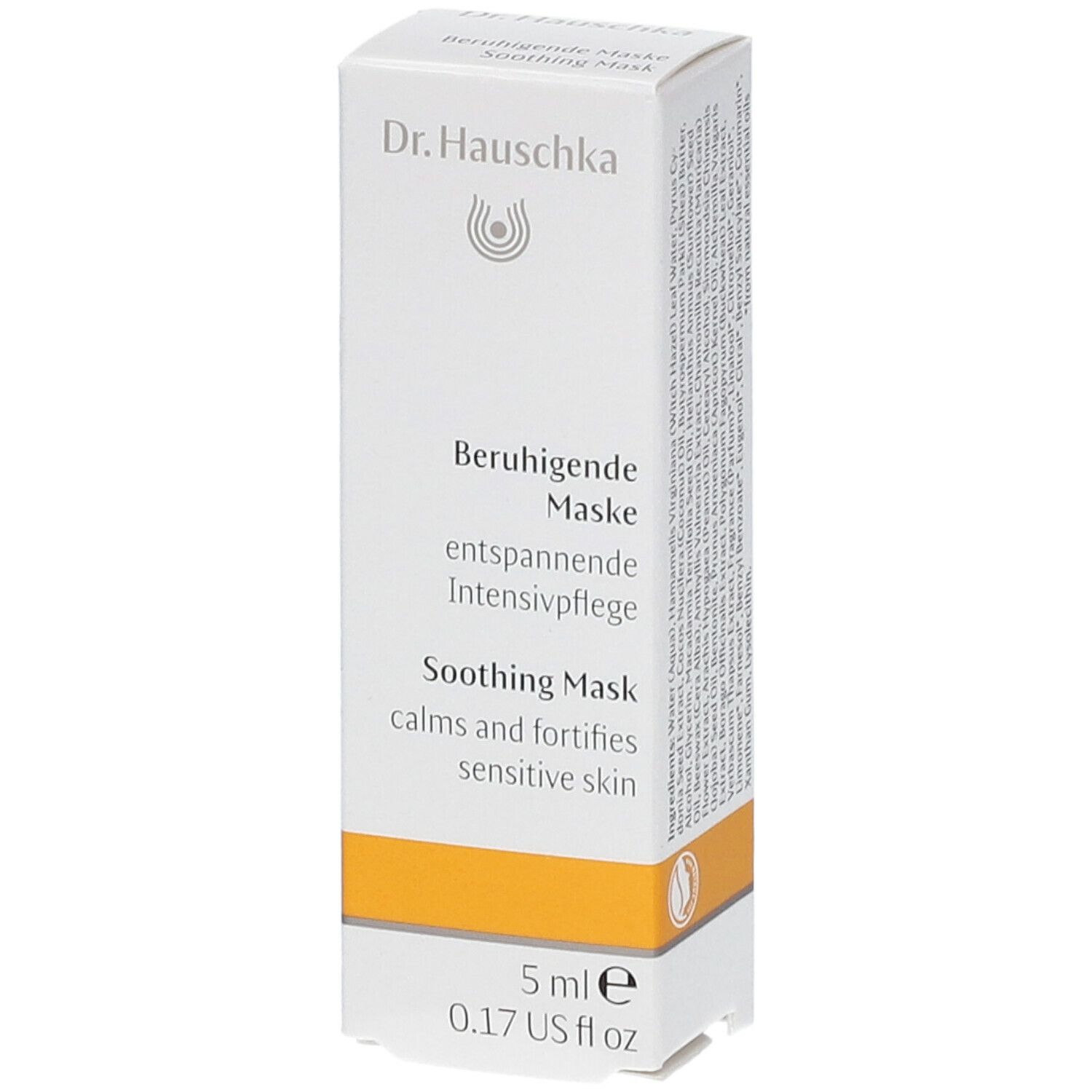 Scatola con prodotto. Scritta: Dr. Hauschka, Beruhigende Maske, Soothing Mask. 5 ml. Striscia gialla.