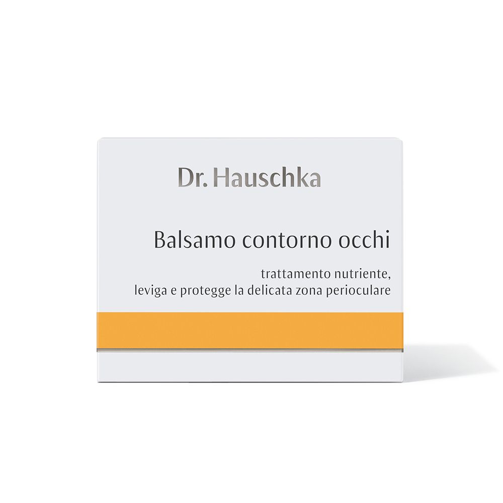 Scatola bianca con fascia gialla. Scritta: Dr. Hauschka, Balsamo contorno occhi.