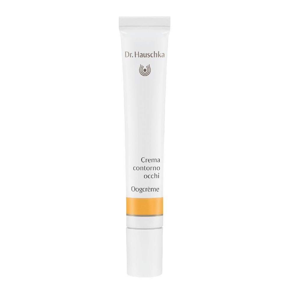 Tubo bianco con crema contorno occhi. Scritta: Dr. Hauschka, Oogcrème. Striscia gialla in basso.