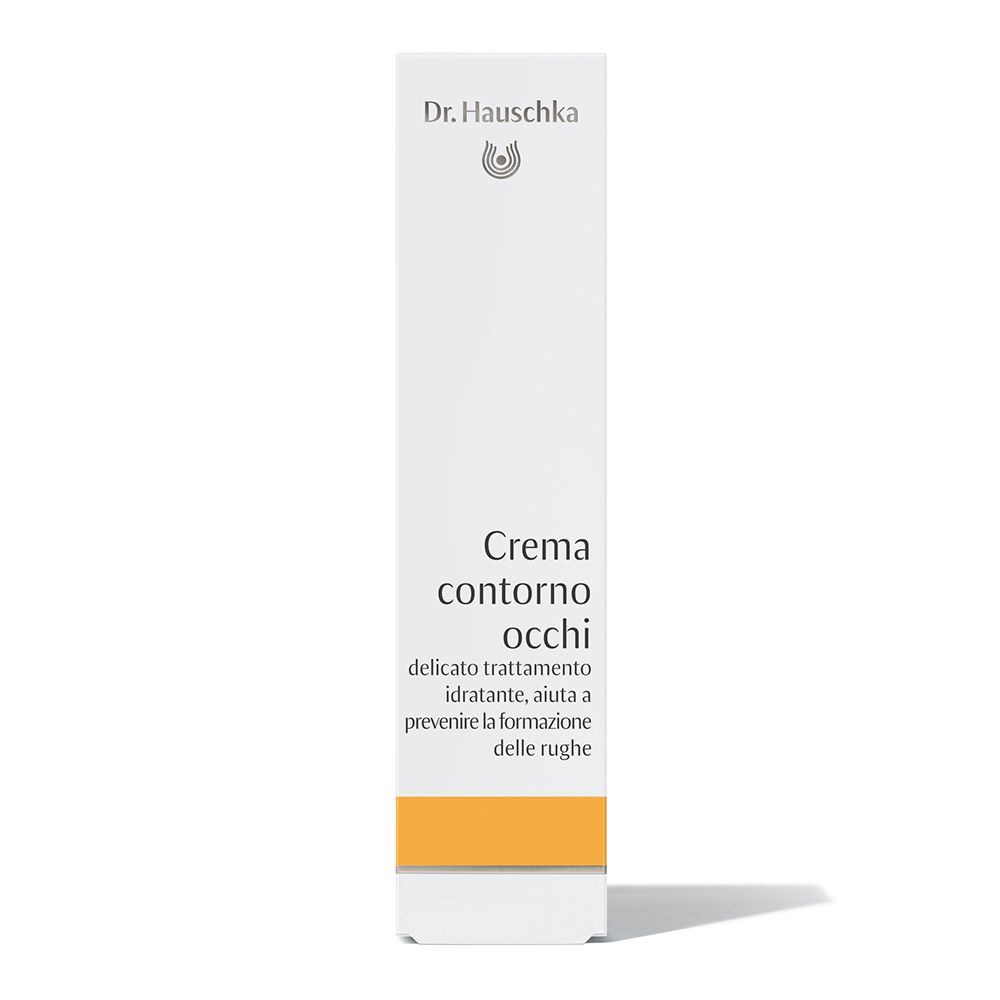 Confezione bianca con crema contorno occhi. Scritta: Dr. Hauschka, Oogcrème. Striscia gialla in basso.