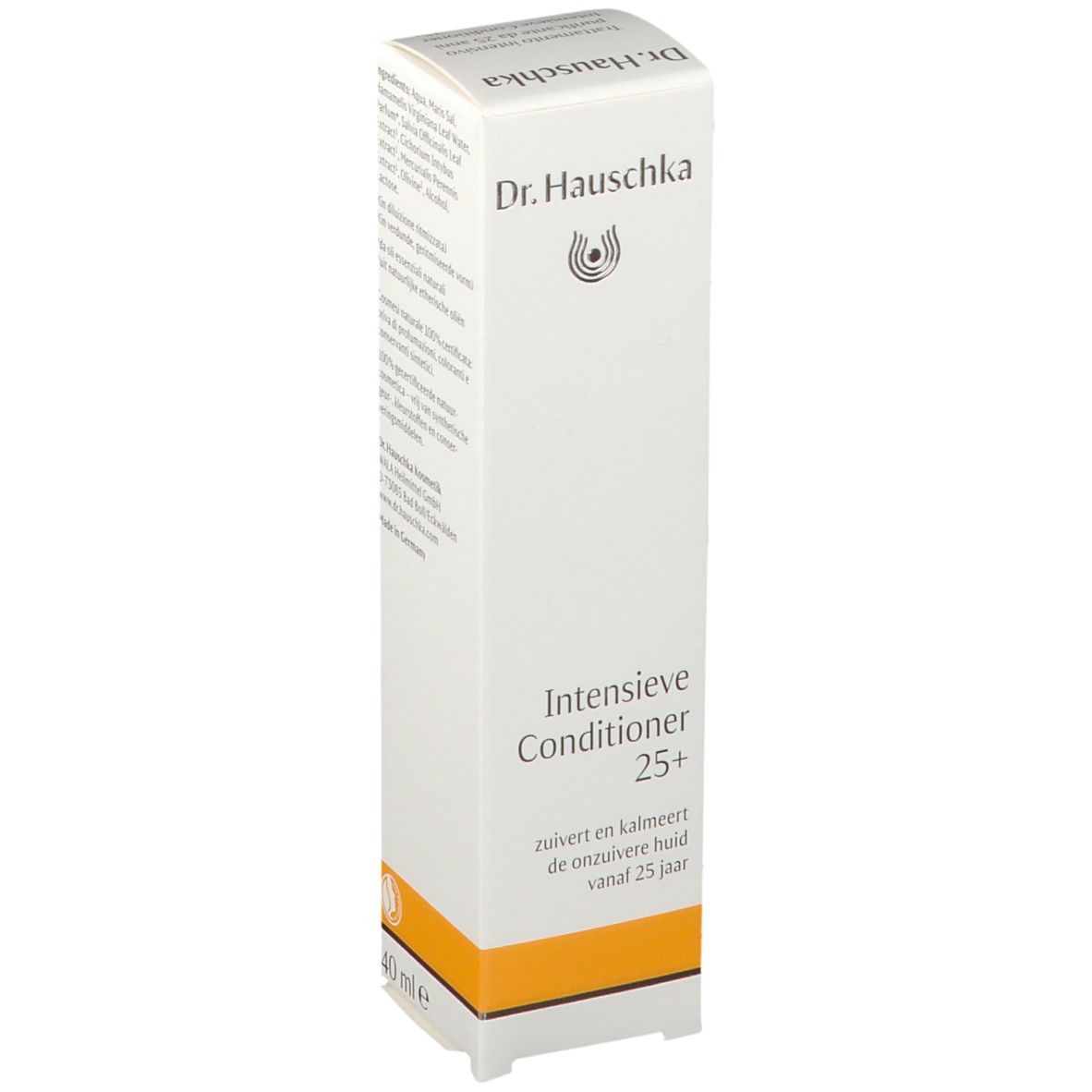 Confezione bianca con informazioni sul prodotto. Scritta: Dr. Hauschka, Intensivkur klärend ab 25. Striscia arancione.