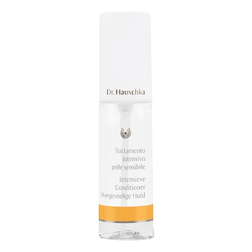 Flacone trasparente con erogatore spray. Scritte: Dr. Hauschka, Trattamento intensivo pelle sensibile, Intensieve Conditioner.