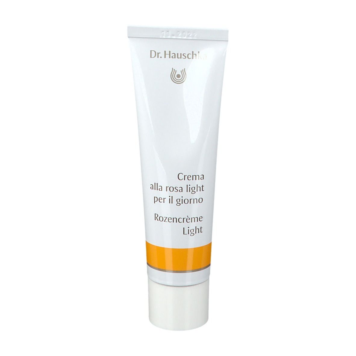 Tubo bianco con fascia gialla. Scritta: Dr. Hauschka, Creme alla rosa light per il giorno, Rozencrème Light.