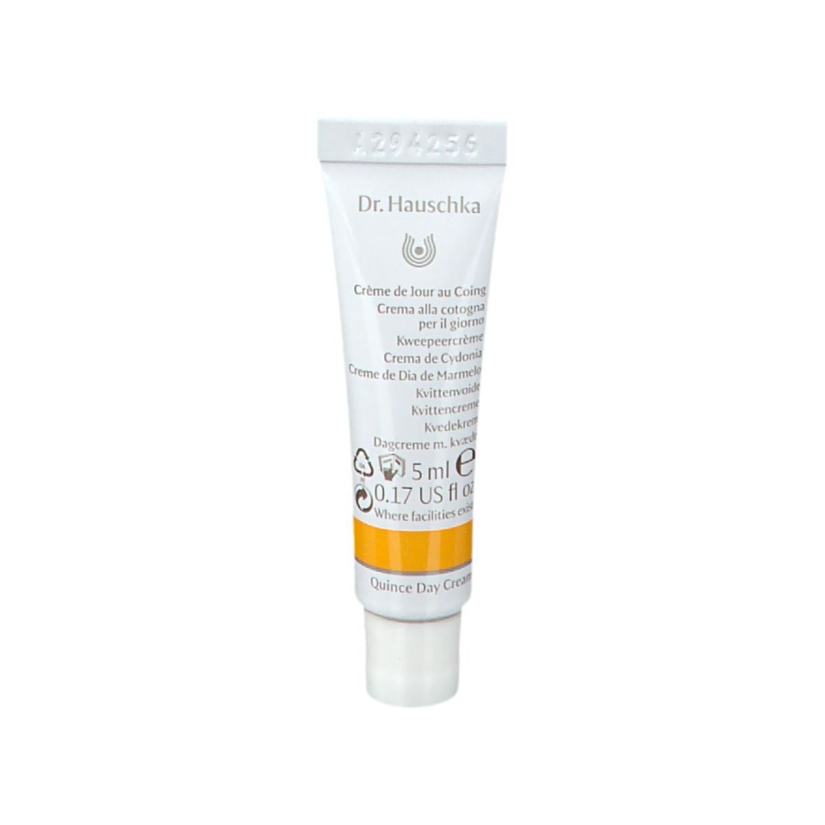 Piccolo tubo di crema. Testo multilingue. 5 ml. Marchio Dr. Hauschka. Striscia gialla.