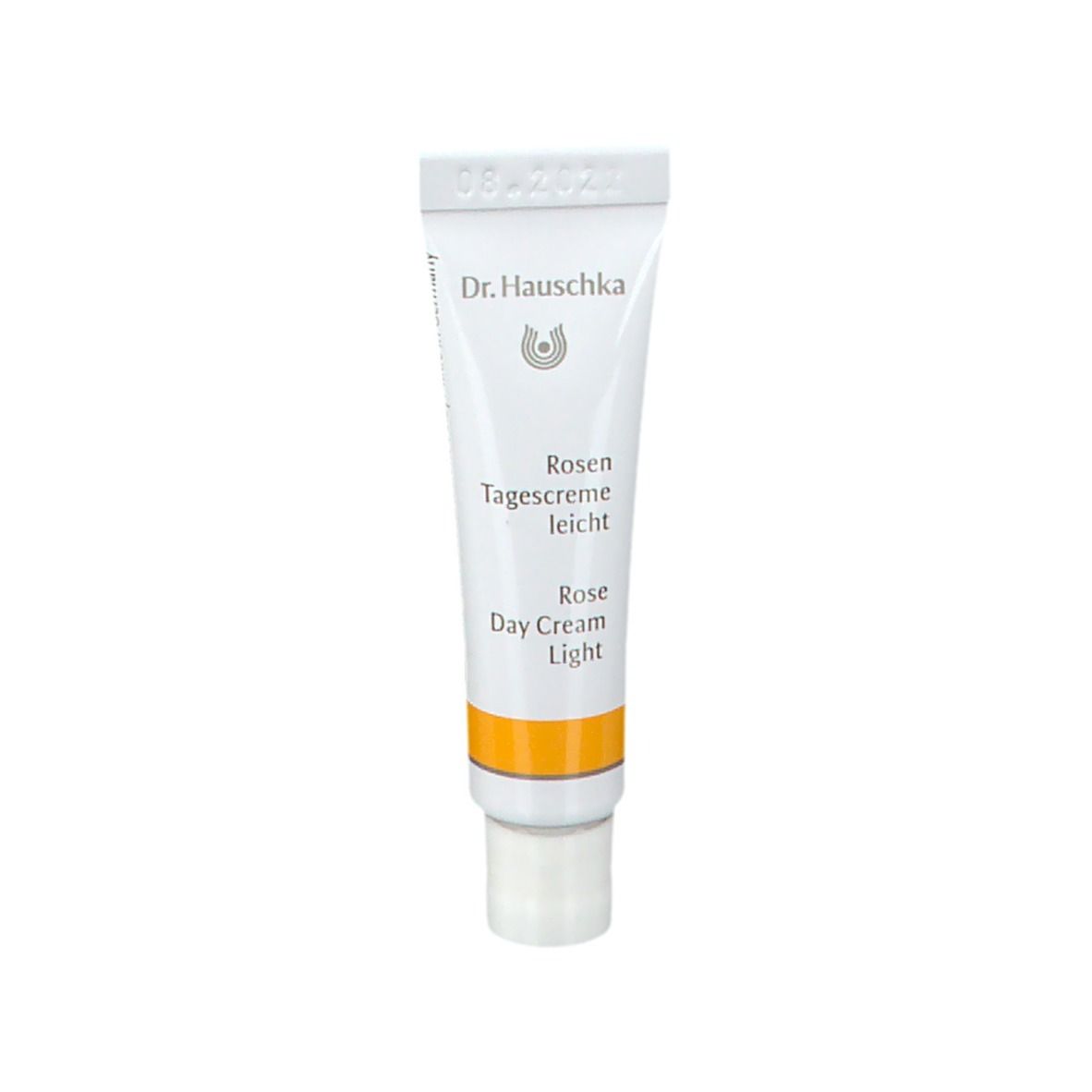 Tubo bianco con Dr. Hauschka, Rosen Tagescreme leicht, Rose Day Cream Light. Striscia gialla. Data.