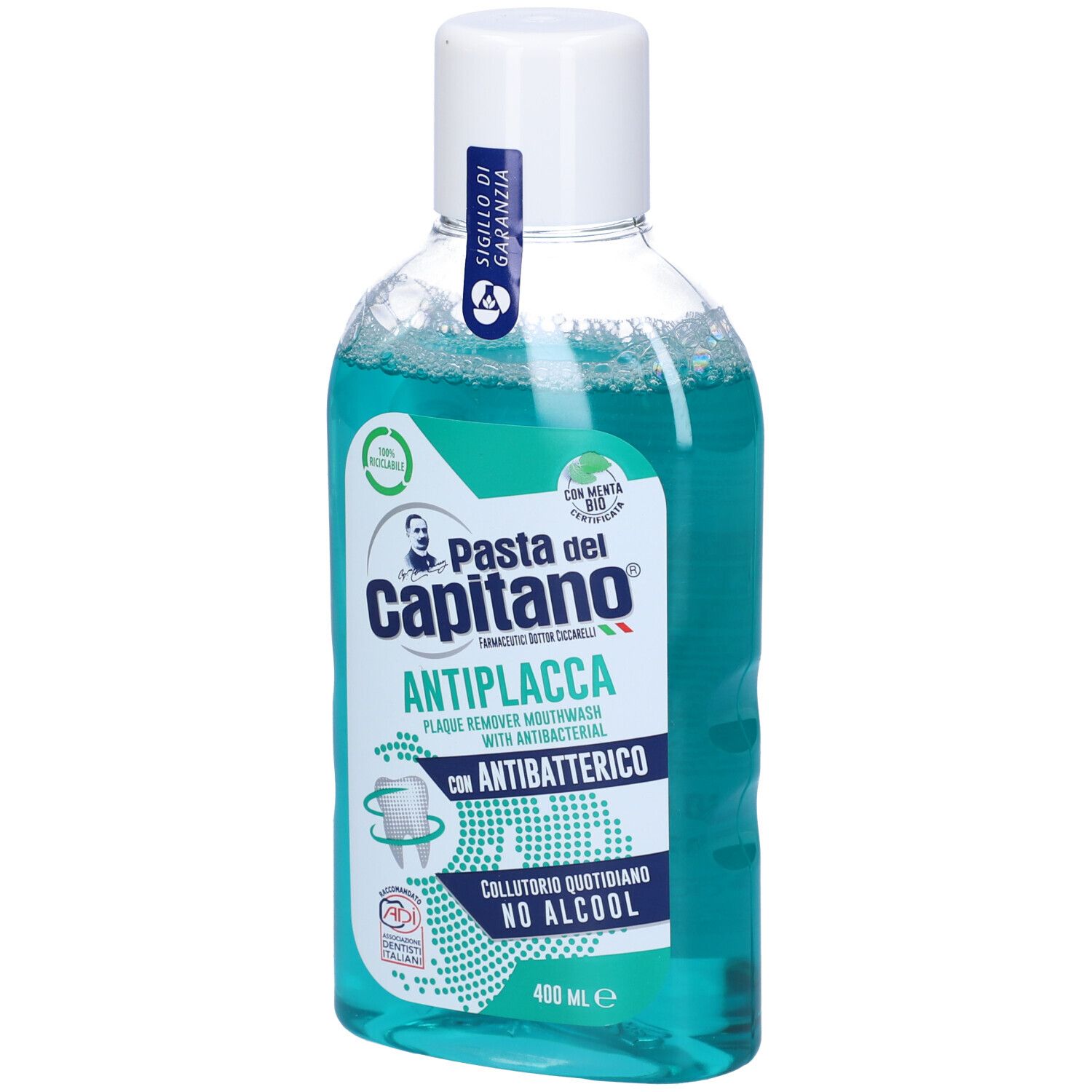 Collutorio in bottiglia trasparente con tappo bianco. Scritta: Pasta del Capitano Antiplacca.