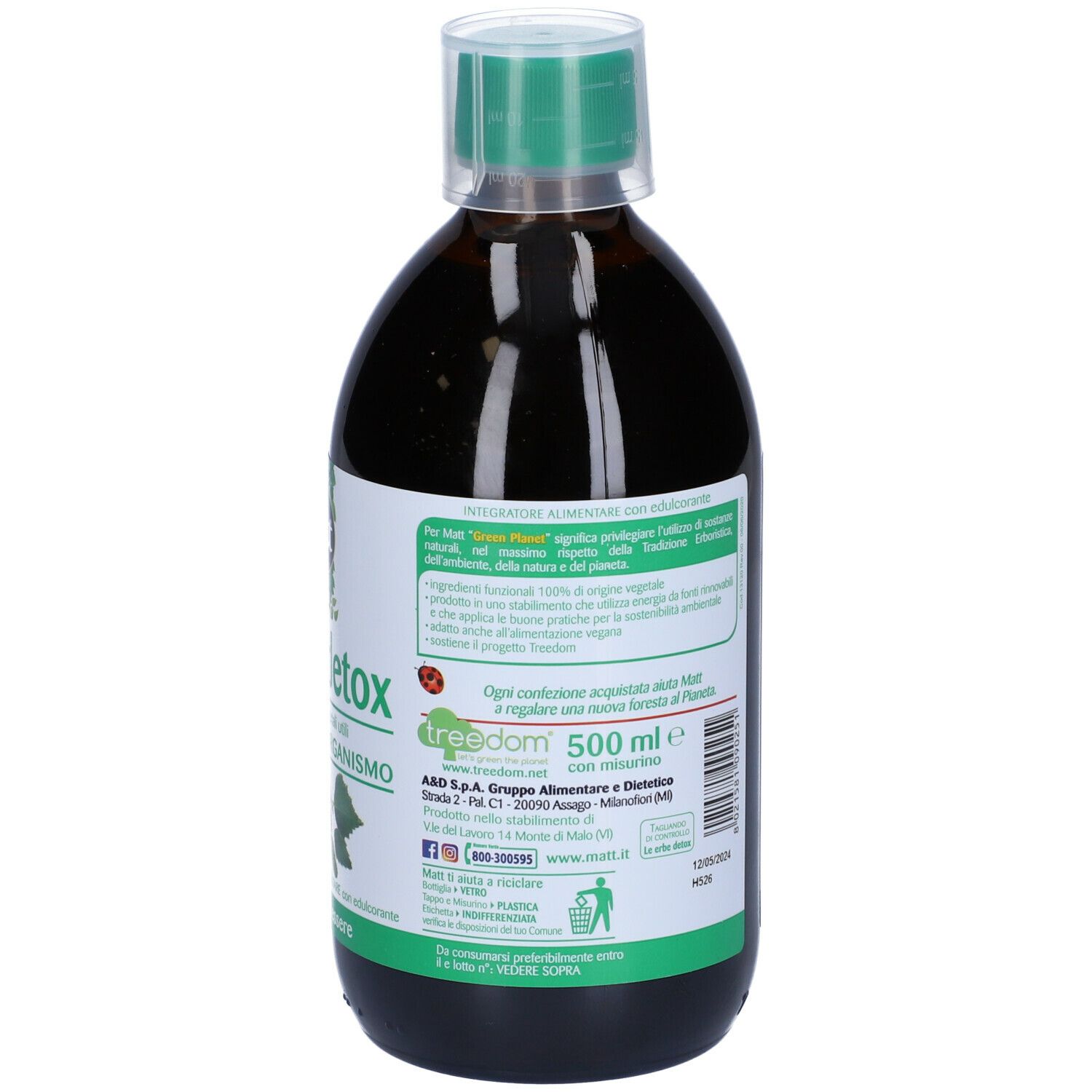 Bottiglia di liquido marrone. Etichetta con informazioni sul prodotto, ingredienti e logo.