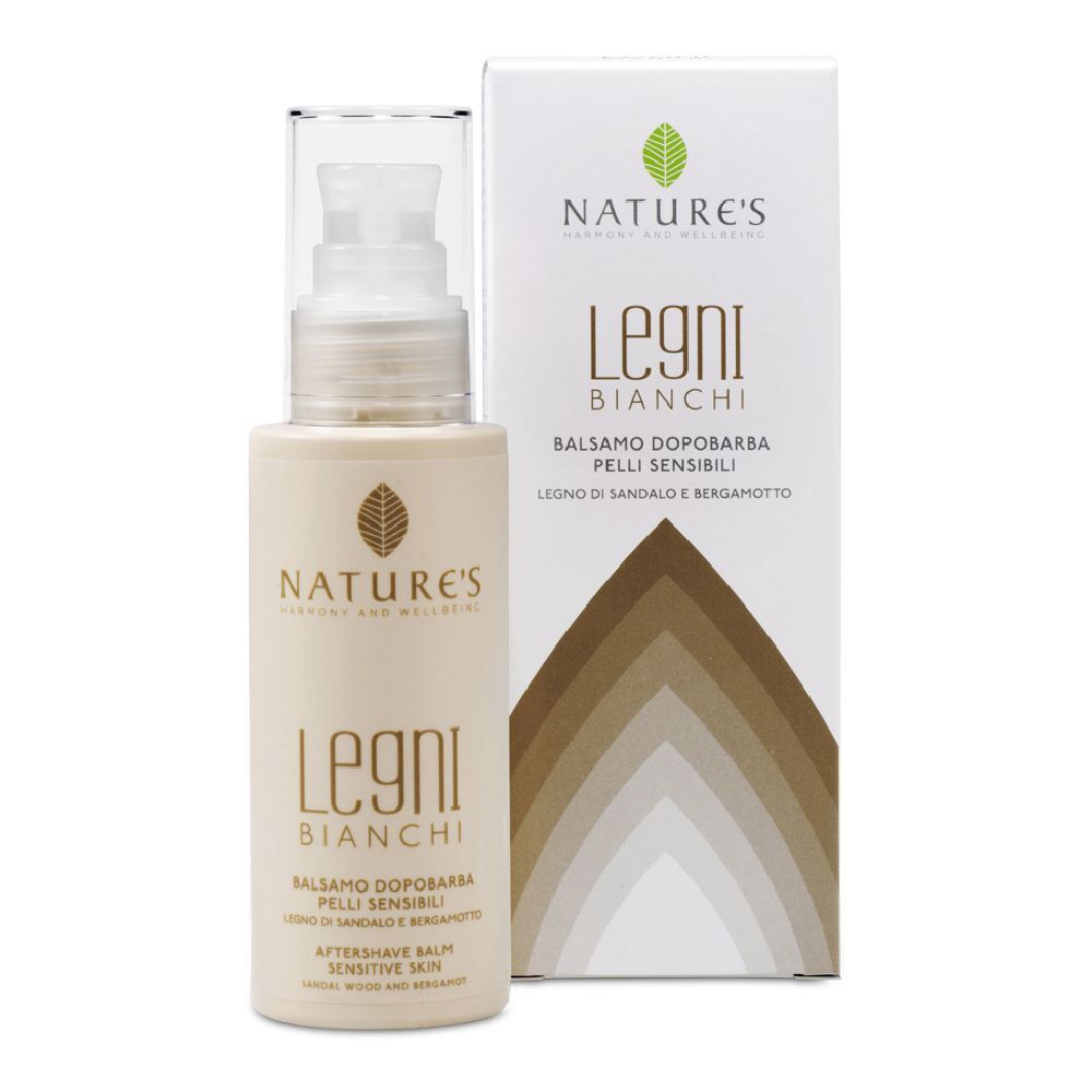 Flacone beige con pompa e scatola. Scritta: Legni Bianchi, Balsamo Dopobarba. Marchio: Nature's.