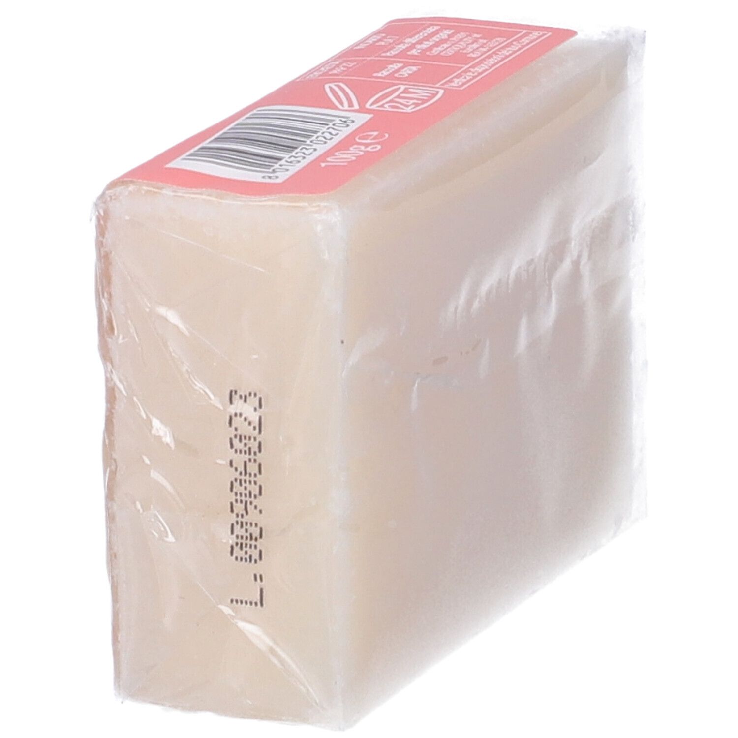 Ein Block weißer Seife, verpackt in transparenter Folie, mit einem rosa Etikett und Barcode.