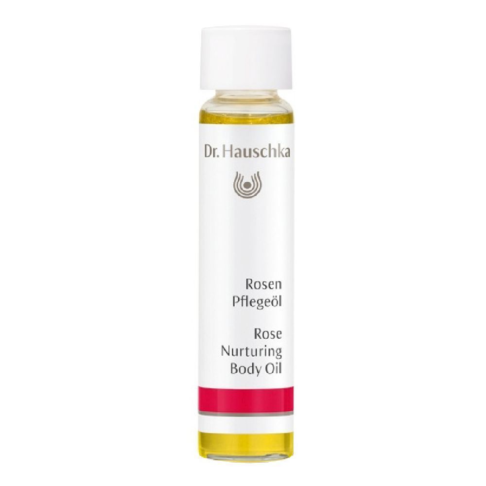 Piccola bottiglia con tappo bianco. Etichetta con logo Dr. Hauschka e testo: Rosen Pflegeöl, Rose Nurturing Body Oil.