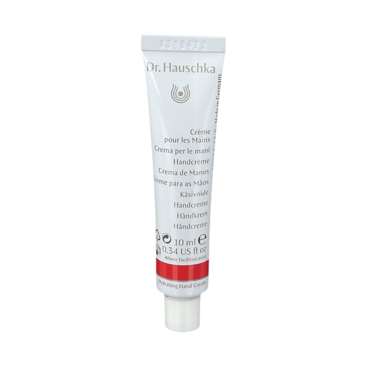 Tubo bianco con fascia rossa. Scritta: Dr. Hauschka, Crème pour les Mains, 10 ml.
