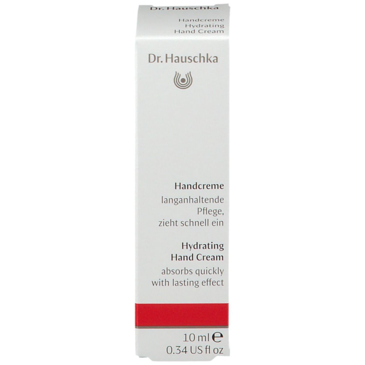 Confezione bianca. Scritta: Dr. Hauschka, Handcreme, Hydrating Hand Cream, 10 ml.