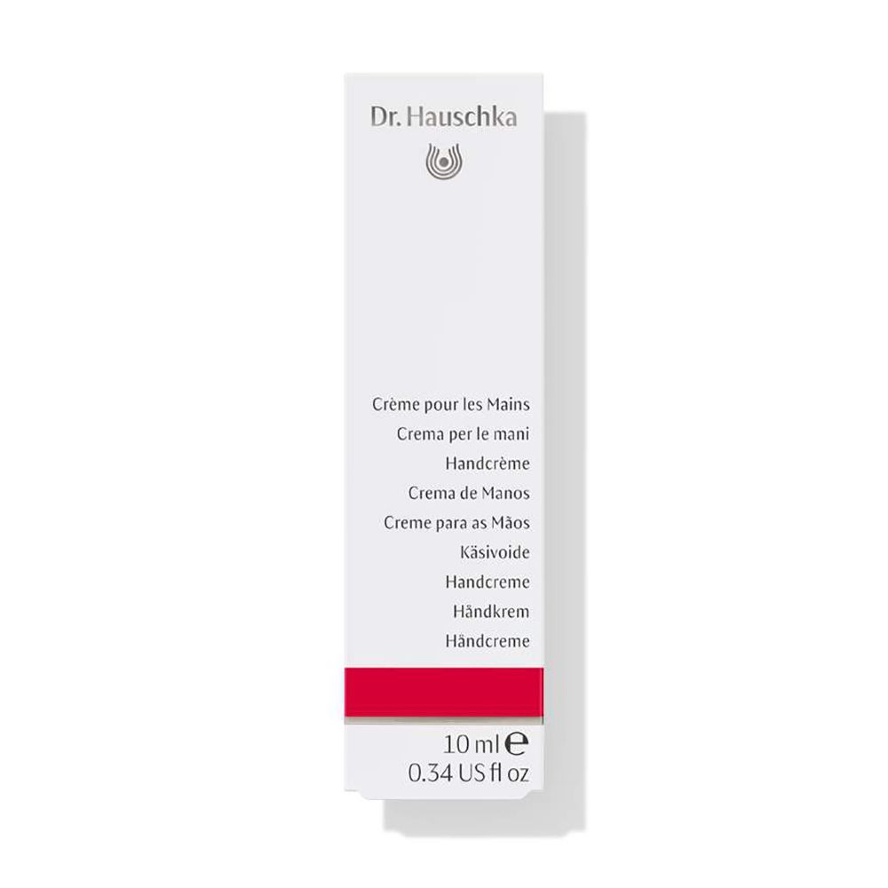 Confezione bianca con fascia rossa. Scritta: Crème pour les Mains, Handcreme, 10 ml.