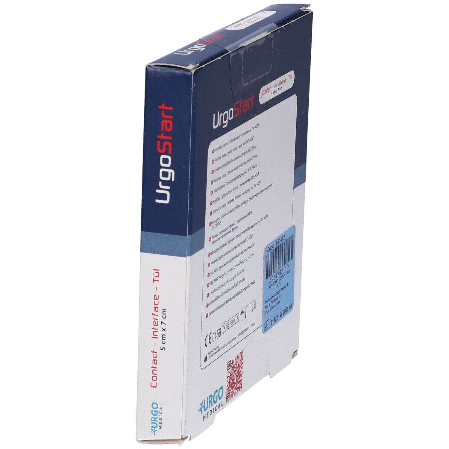 Confezione di UrgoStart Contact in diagonale. Scritta: UrgoStart, Contact - Interface - Tül, 5 cm x 7 cm. Logo: Urgo Medical.
