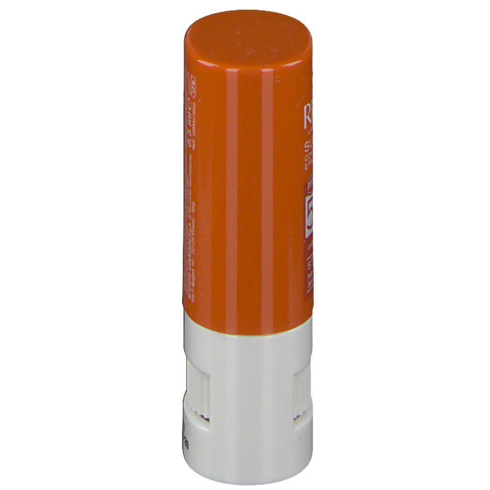 Stick solare arancione e bianco. Vista laterale. Testo sulla parte arancione. Meccanismo rotante bianco.