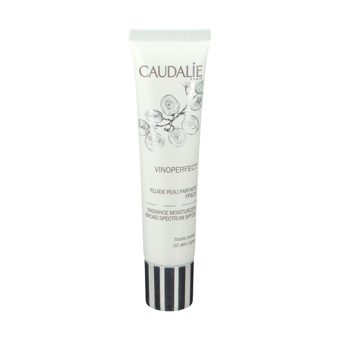Tubo bianco CAUDALIE Vinoperfect Fluido Pelle Perfetta SPF20. Strisce bianche e nere sul fondo.