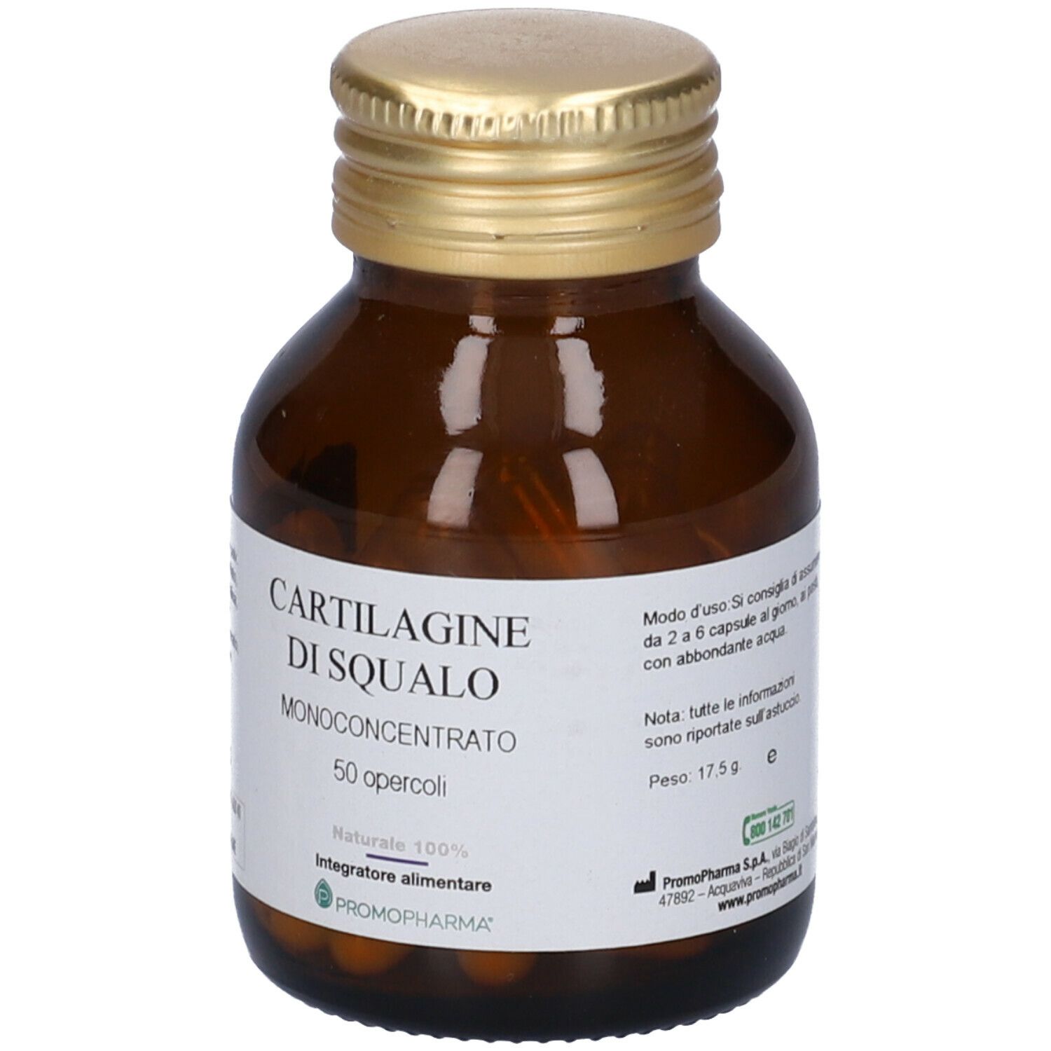 Flacone di vetro marrone con tappo dorato. Etichetta con nome del prodotto e informazioni. Capsule visibili.
