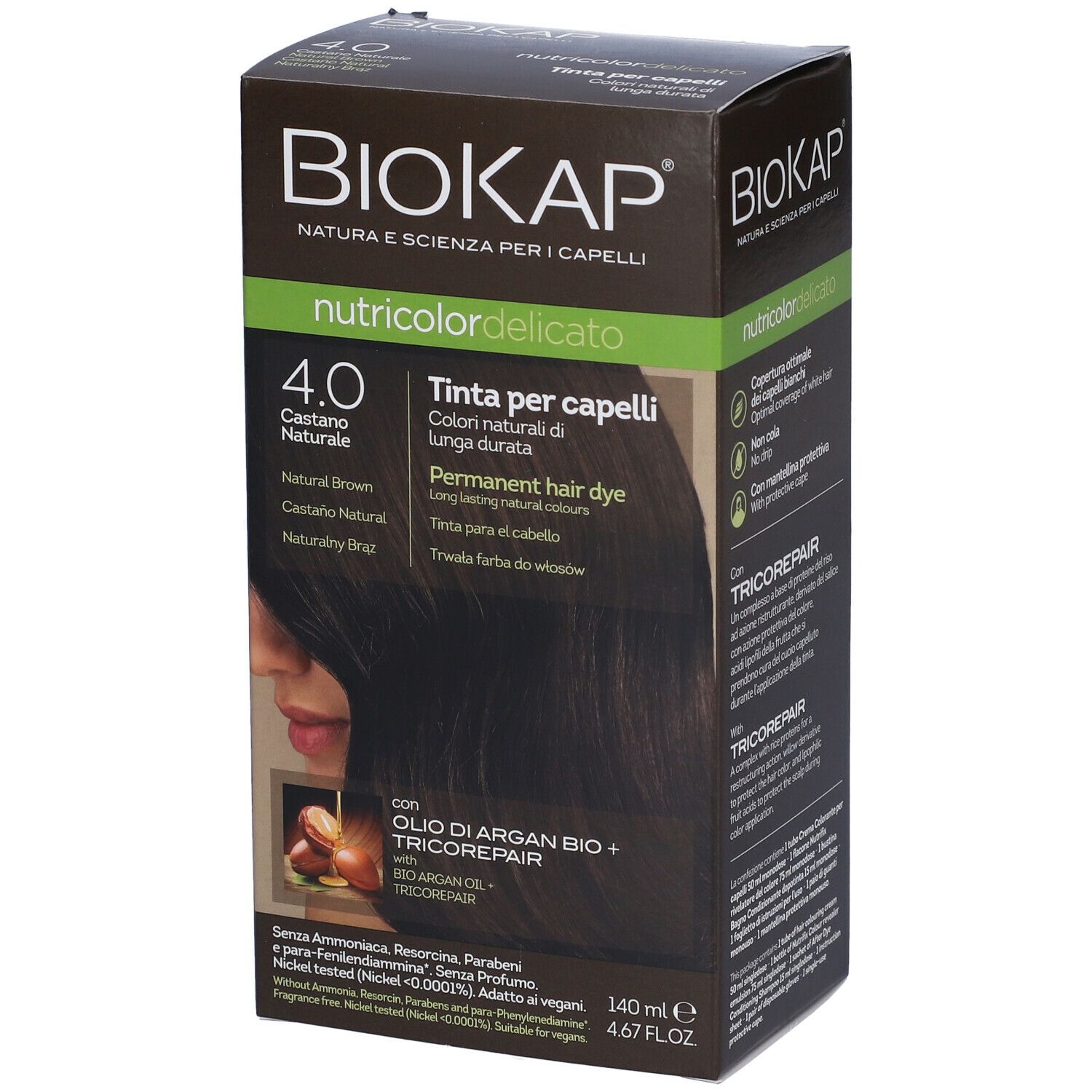 Braune Haarfärbemittel-Schachtel. Aufschrift: BioKap Nutricolor Delicato 4.0 Castano Naturale. Abbildung einer Frau mit braunen Haaren.