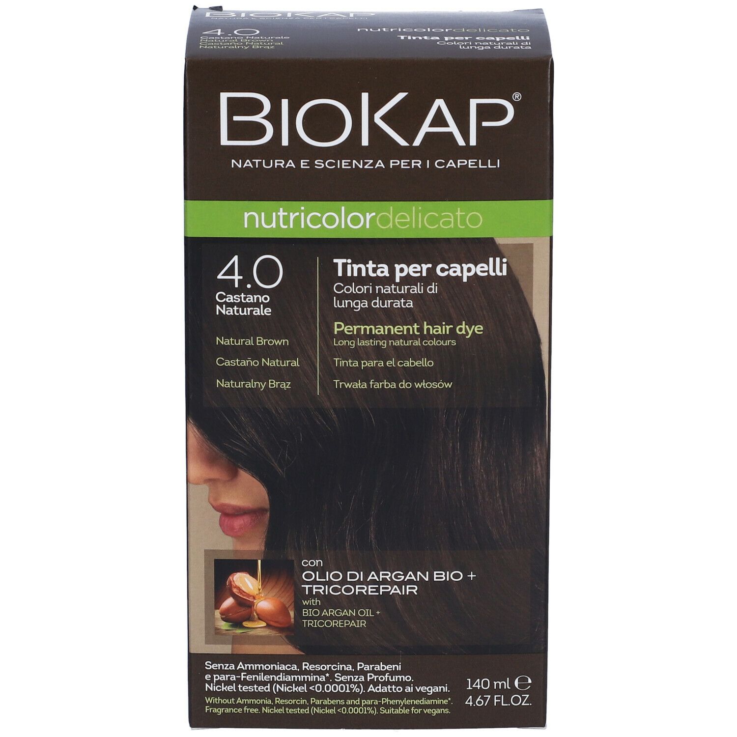 Braune Haarfärbemittel-Schachtel. Aufschrift: BioKap Nutricolor Delicato 4.0 Castano Naturale. Abbildung einer Frau mit braunen Haaren.