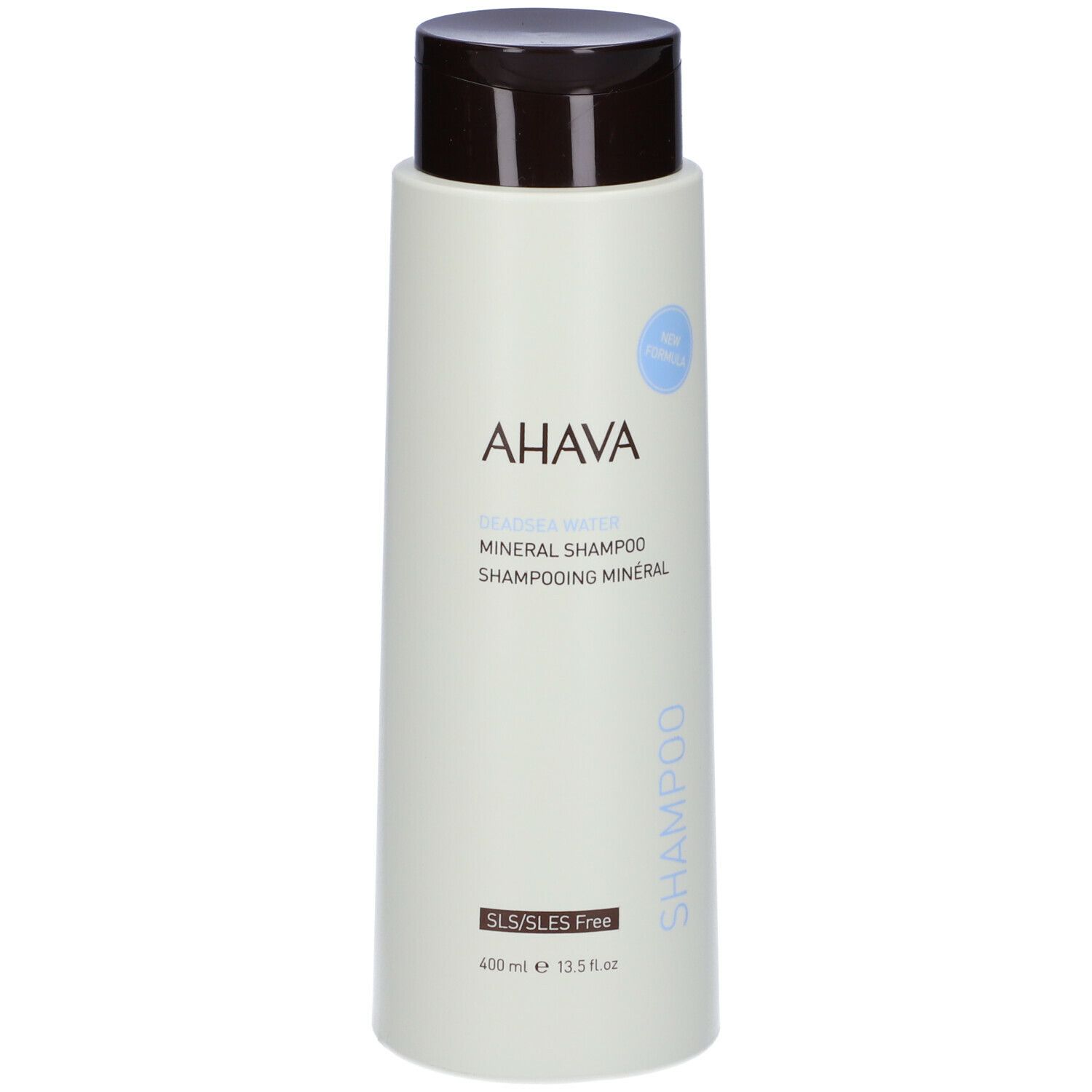Flacone di shampoo AHAVA Minerale. Flacone verde chiaro con tappo marrone. Scritta AHAVA e Shampoo. Senza SLS/SLES.