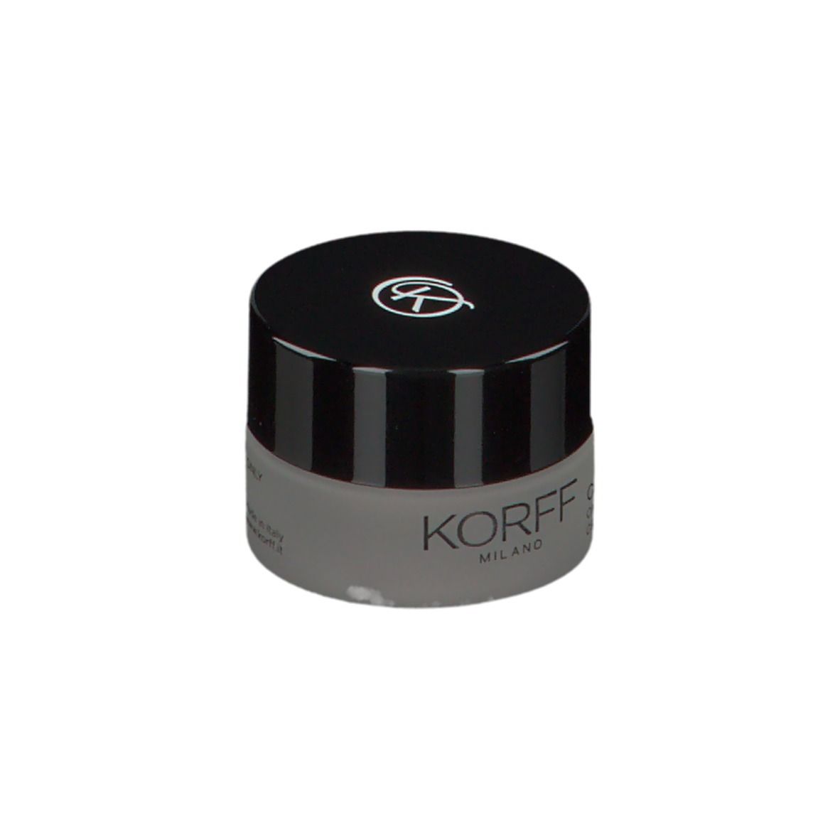 Ombretto in crema KORFF chiuso. Vasetto grigio, coperchio nero con logo. Testo: KORFF MILANO, CURE MAKE UP, CREMA EYESHADOW.