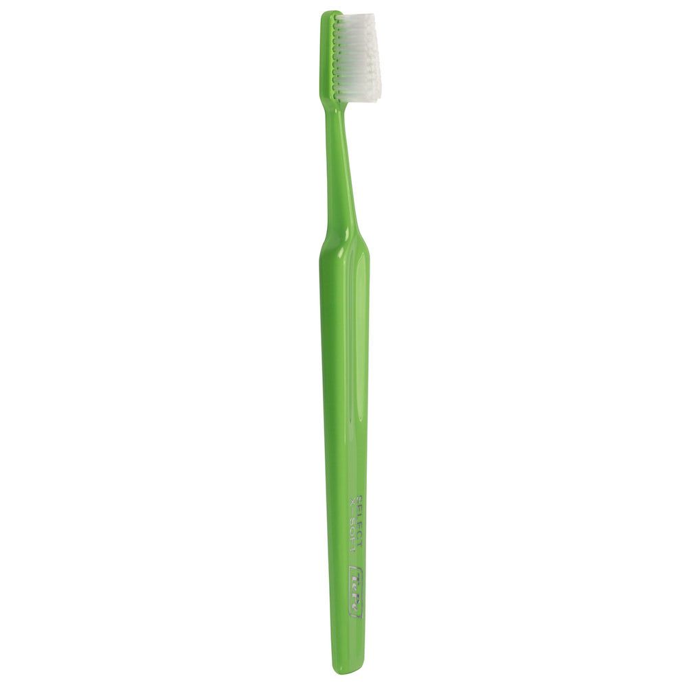 Spazzolino verde TePe Select X-Soft con setole bianche.