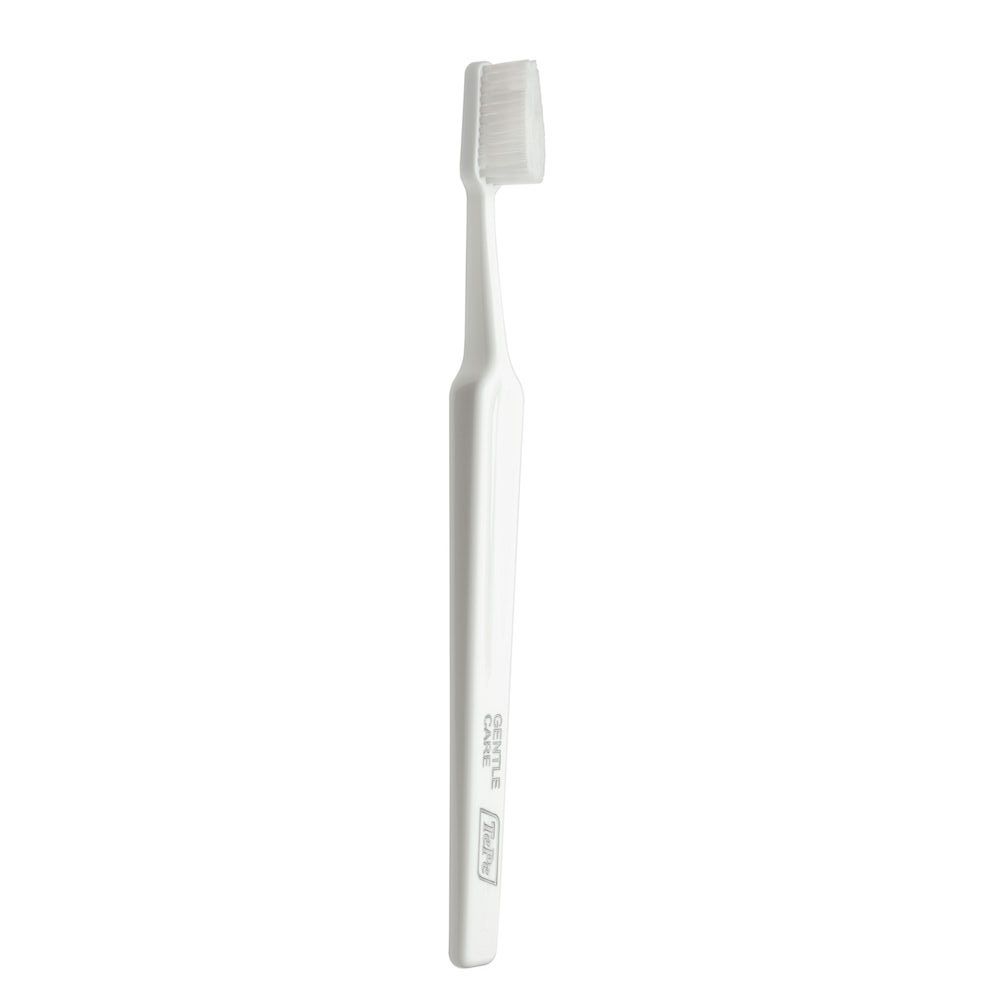 Spazzolino TePe Gentle Care bianco. Testina con setole morbide. Manico con marchio.
