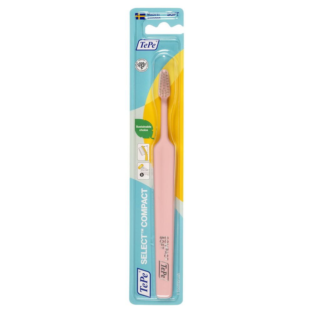 Spazzolino TePe Select Compact Soft, manico rosa, setole grigio chiaro, in confezione.