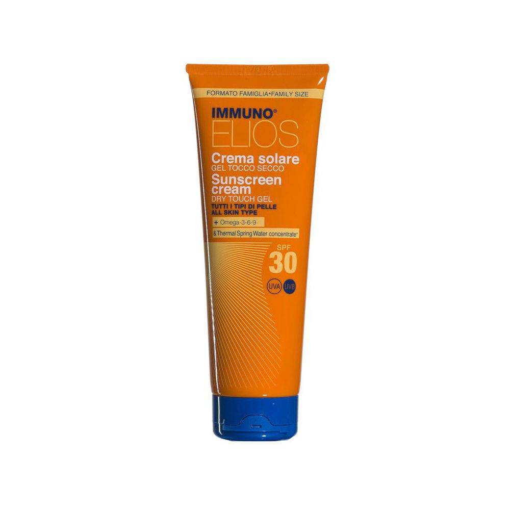 Tubo arancione di crema solare. Testo: IMMUNO ELIOS, Crema solare, Sunscreen cream, SPF 30. Tappo blu.