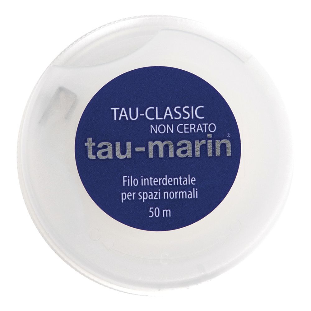 Distributeur de fil dentaire blanc avec étiquette bleue. Texte: tau-marin TAU-CLASSIC NON CERATO. Texte italien.