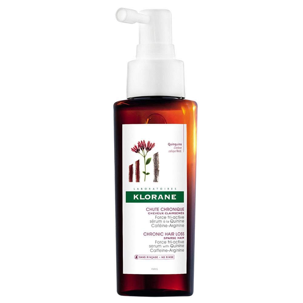 Braune Flasche mit weißem Pumpkopf. Aufschrift: Klorane, Chute Chronique, Chronic Hair Loss. Enthält Koffein-Arginin.