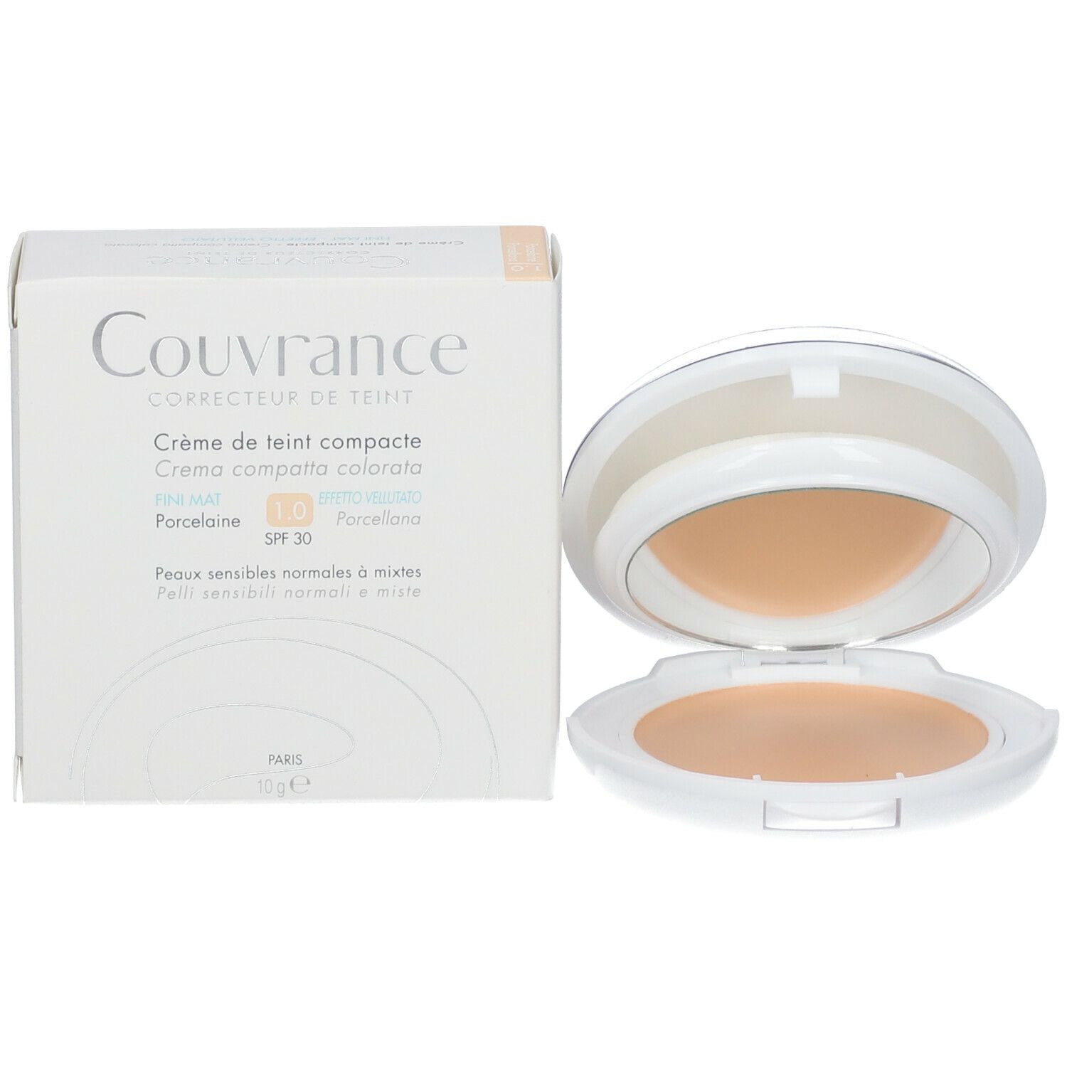 Kompakt-Make-up-Creme in weißer Verpackung, geöffnet. Enthält Creme und Schwamm. Daneben die Verpackung.