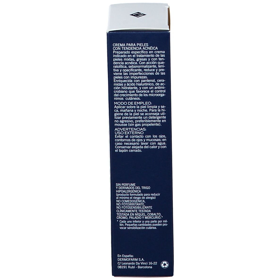 Scatola blu scuro. Testo multilingue. Informazioni e avvertenze sul prodotto.
