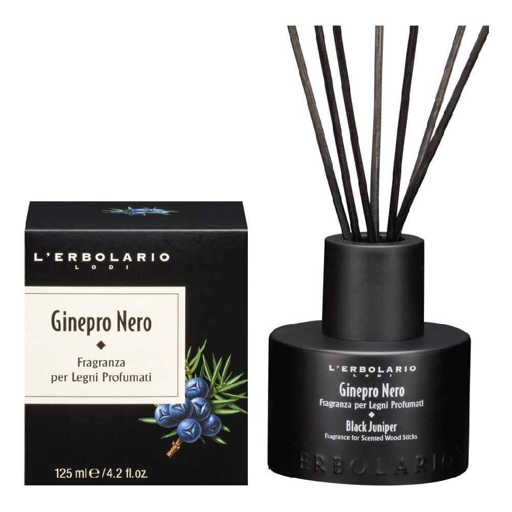 Diffusore nero con bastoncini e confezione. Scritta: Ginepro Nero, Fragranza per Legni Profumati.