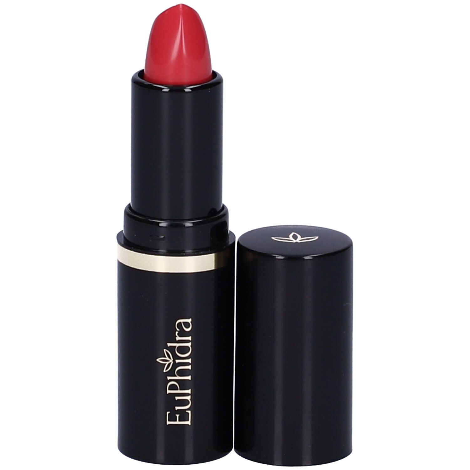 Rossetto rosso in astuccio nero, anello dorato. Aperto, cappuccio accanto.