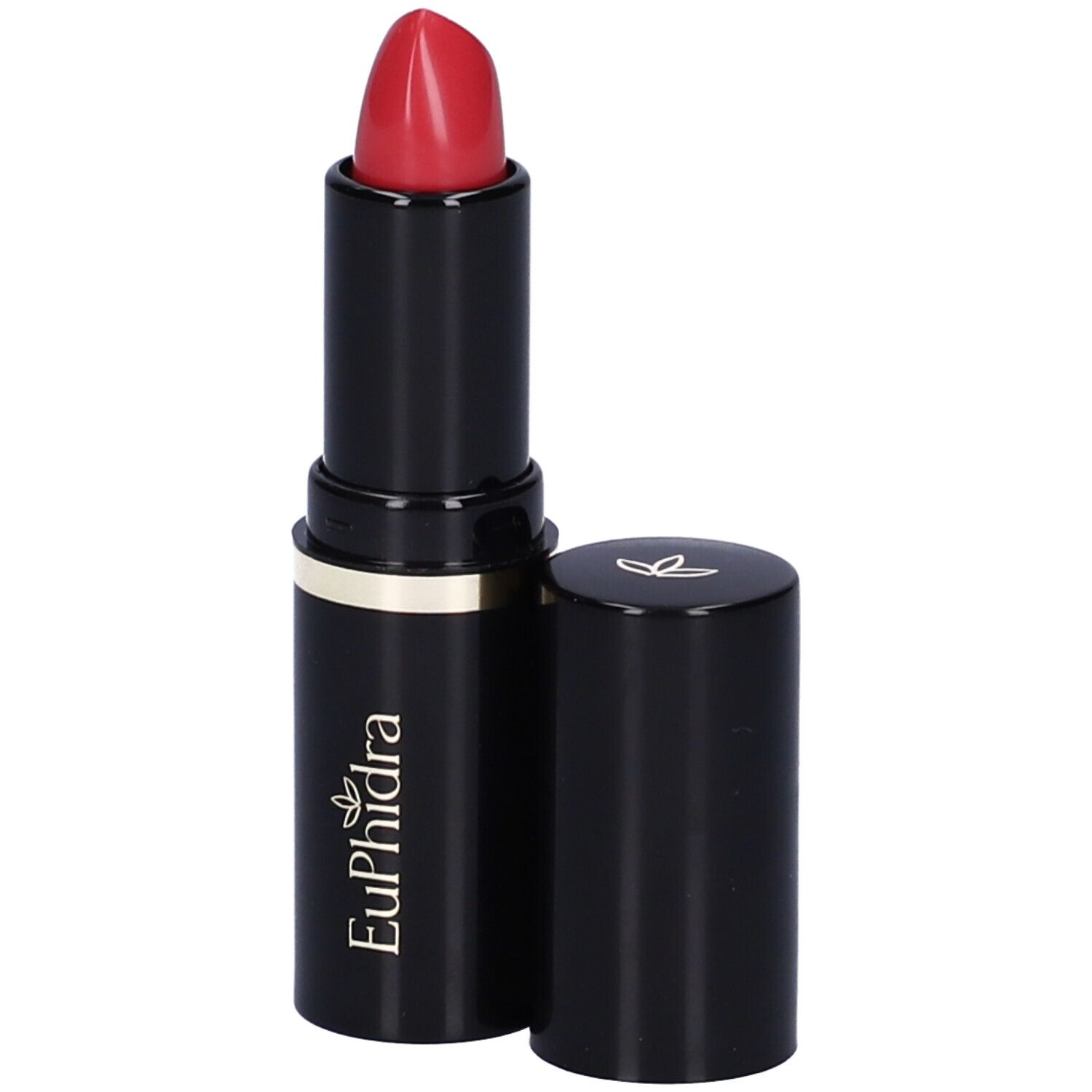 Rossetto rosso in astuccio nero, anello dorato. Aperto, cappuccio accanto.