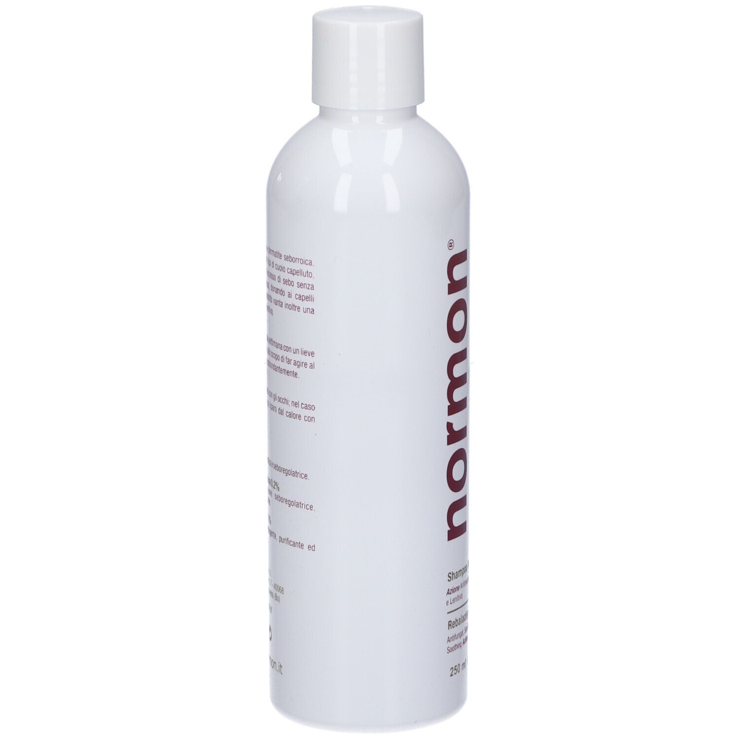 Flacone bianco con scritta rossa 'normon' ed etichetta shampoo. 250ml.
